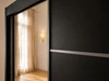 Schiebetürenschrank mit Spiegel 150 cm mit LED-Beleuchtung Portel Schwarz